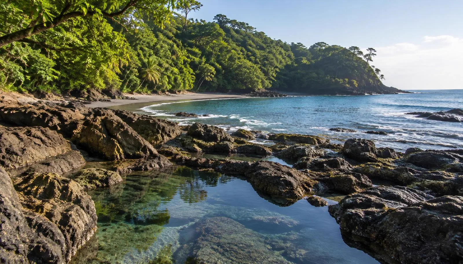 Quiet rocky cove with tide pools and jungle on the Nicoya Peninsula