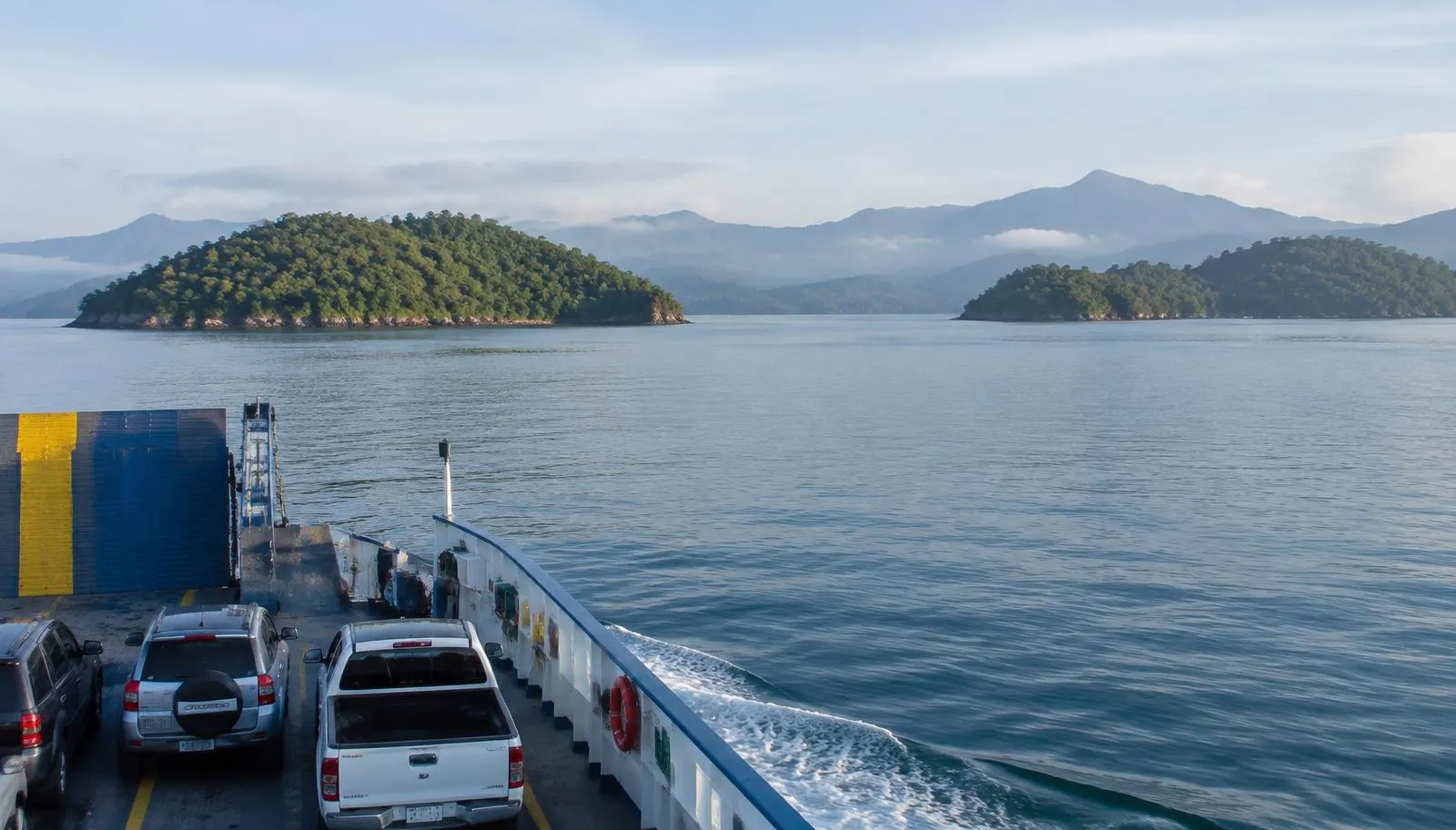 Car ferry crossing the Gulf of Nicoya toward green islands